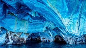 Chile's ethereal turquoise caverns with 'mineral ice cream' on the walls